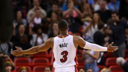 Dwyane Wade #3 of the Miami Heat reacts to the crowd during a game against the Memphis Grizzlies at American Airlines Arena on December 27, 2014 in Miami, Florida. (Source: Mike Ehrmann/Getty Images)